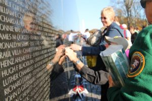 visitors to the vietnam veterans memorial on veterans day credit elvert barnes