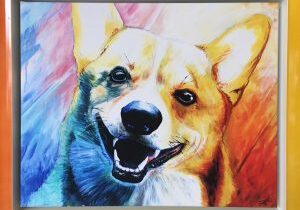 Colorful painting of a smiling corgi dog.