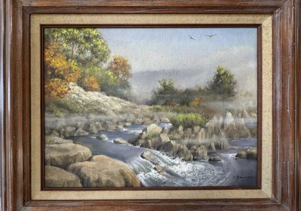 Framed painting of rocky river landscape